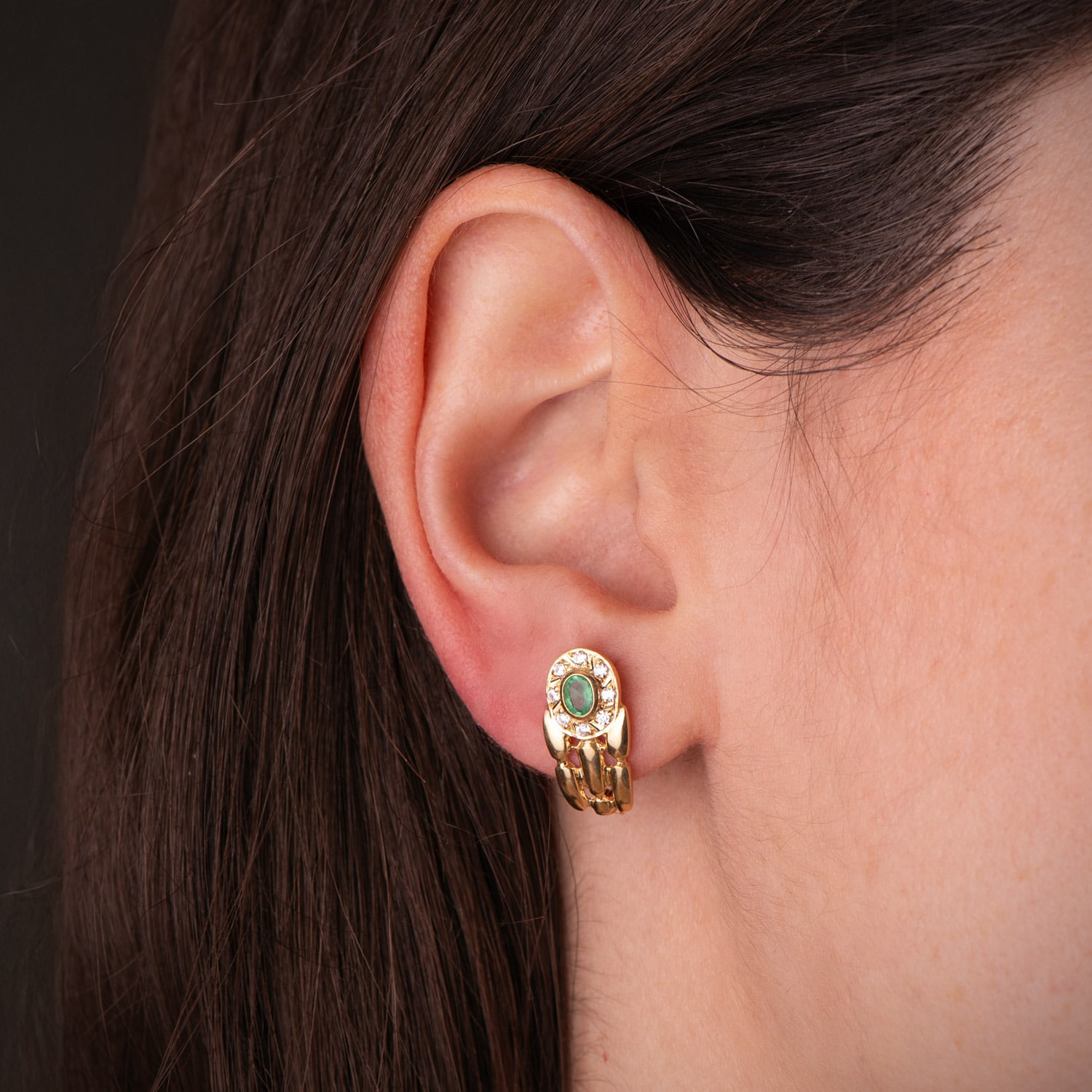 Panter emerald earrings: 18 kt yellow gold