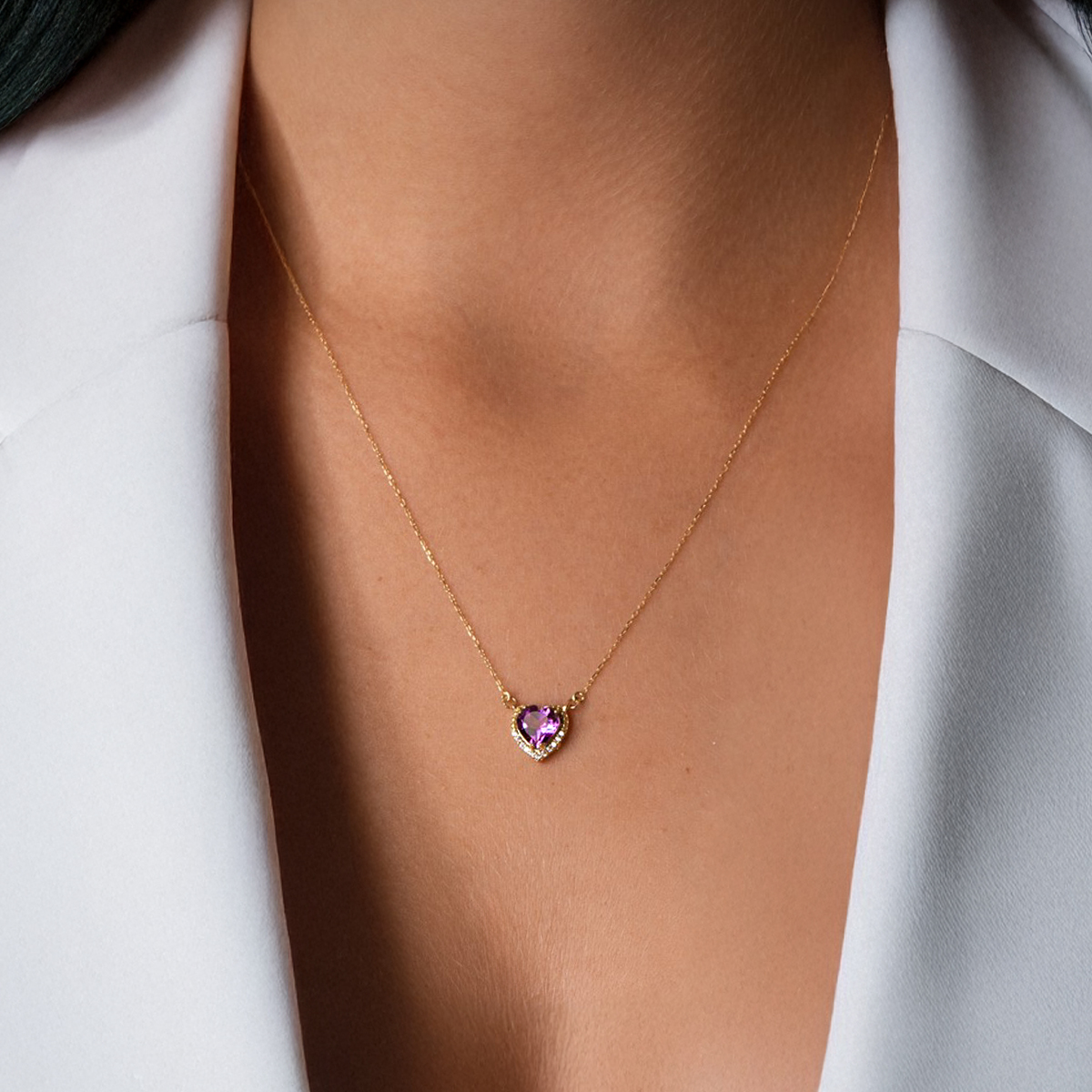 Heart-shaped amethyst necklace: 18 kt yellow gold
