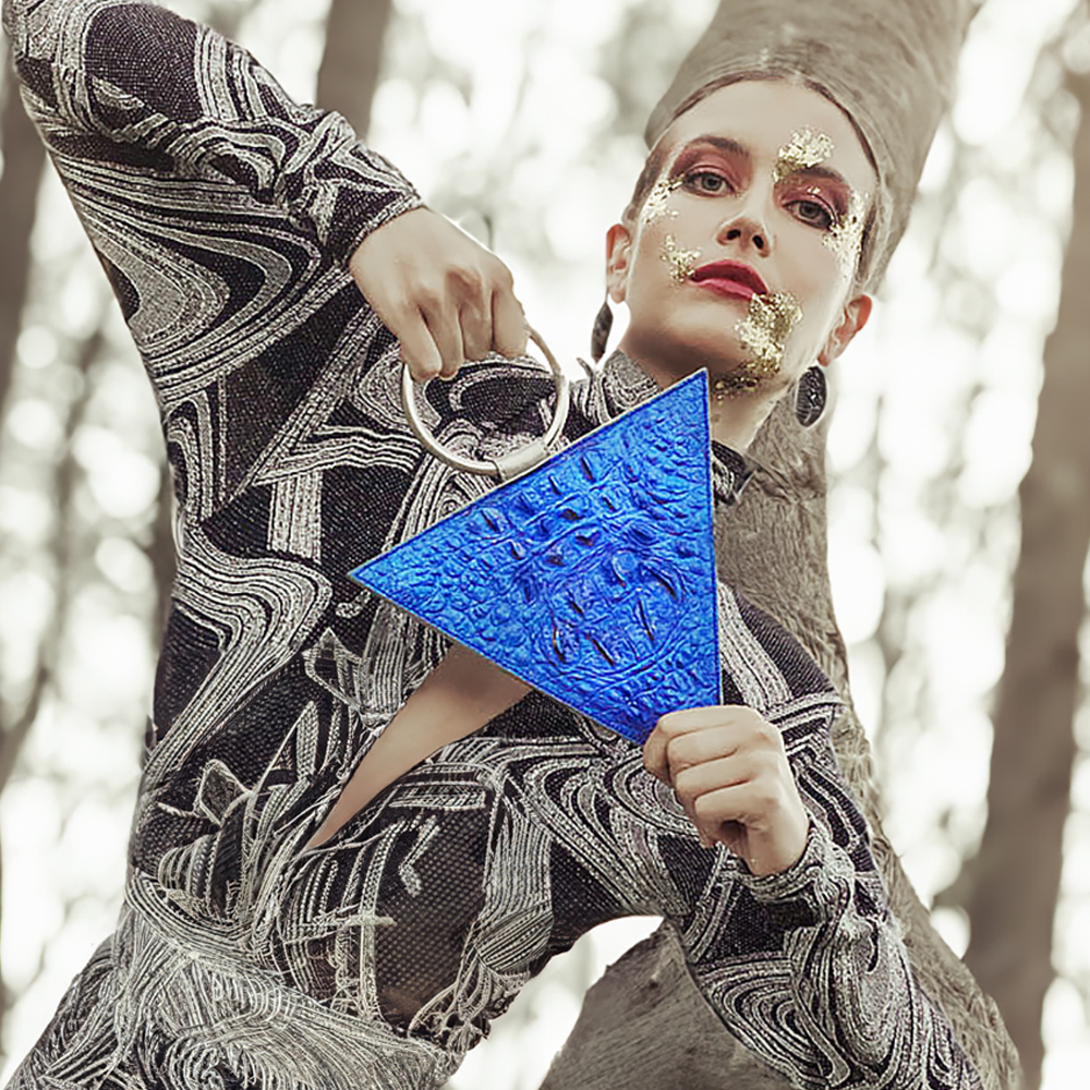 Triangular blue leather bag with handle