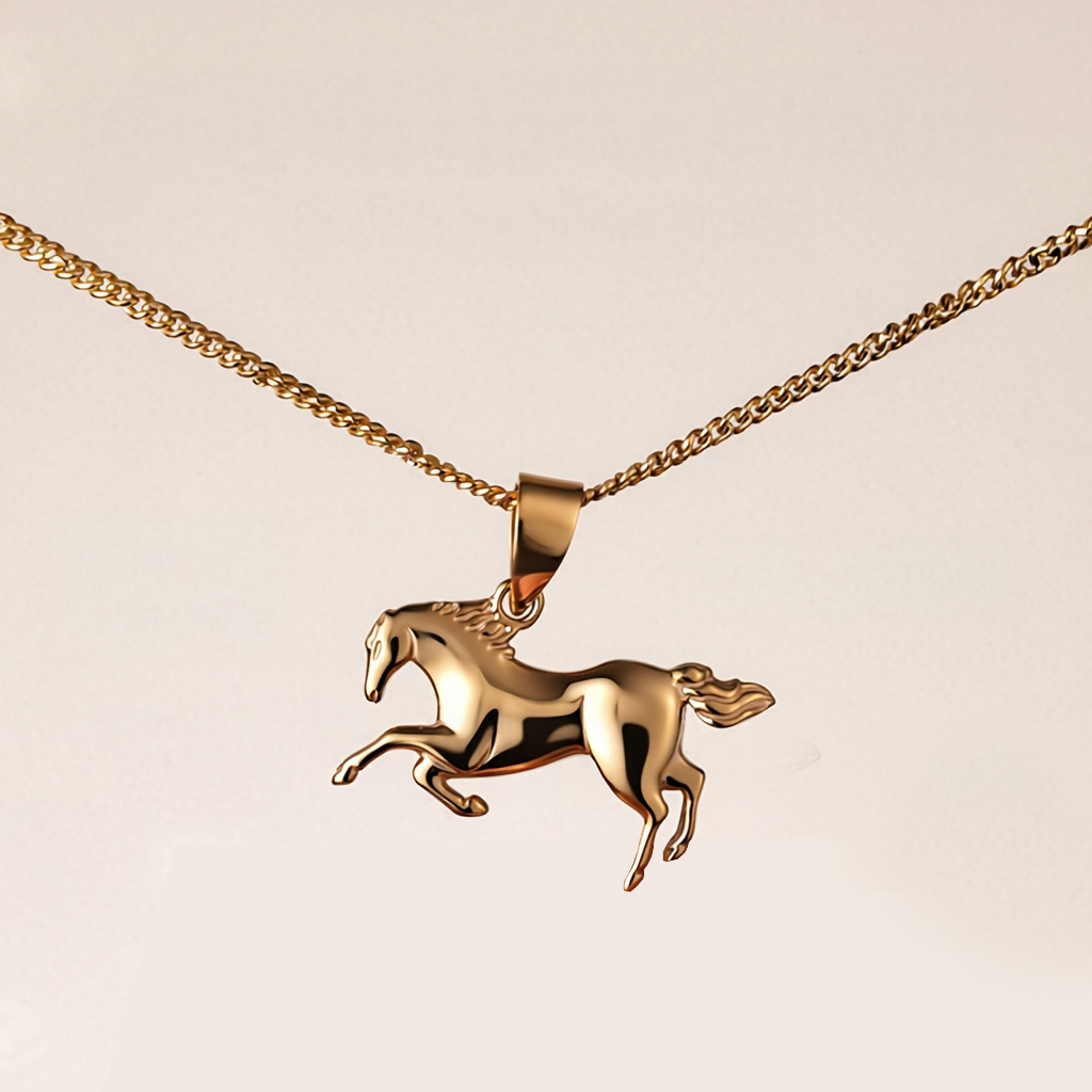 Running horse pendant: 18 kt yellow gold