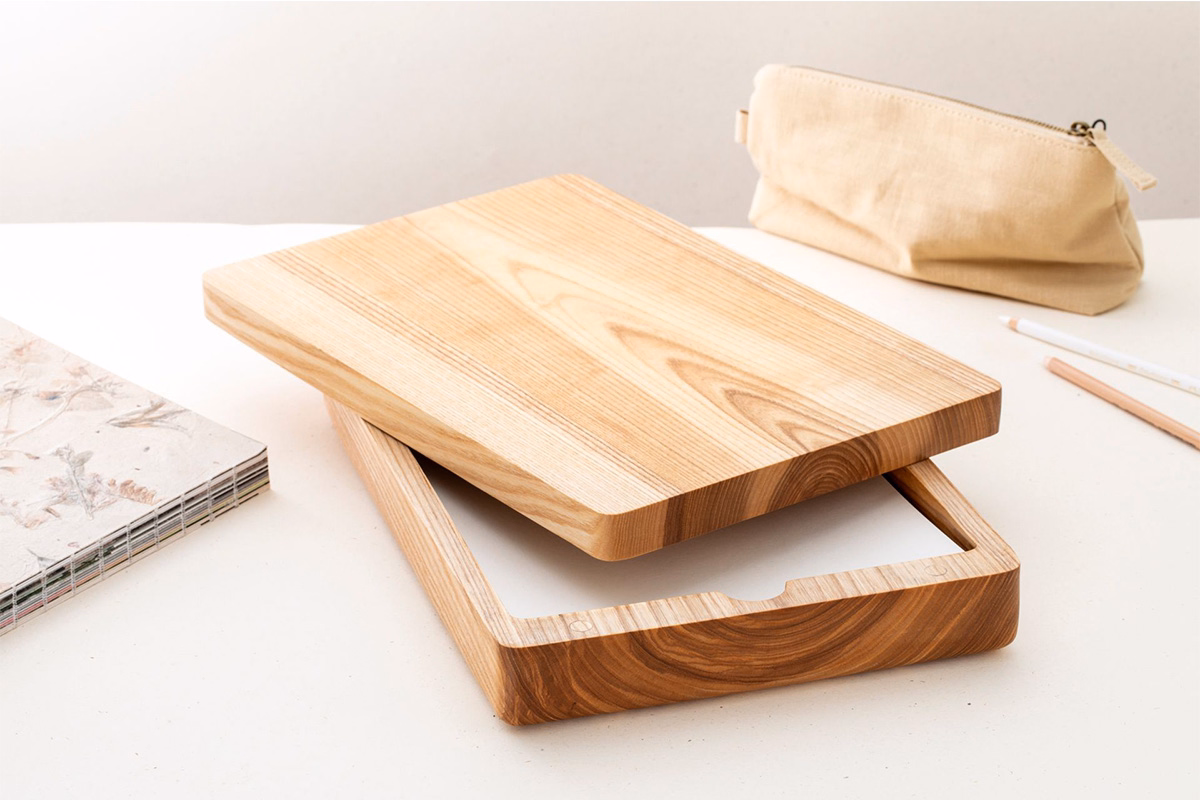 Close-up of bleached ash wood finishing process by Anonymia, close-up view