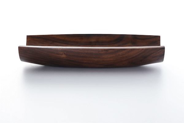 Animated close-up of walnut wood finish by Anonymia, styled shot