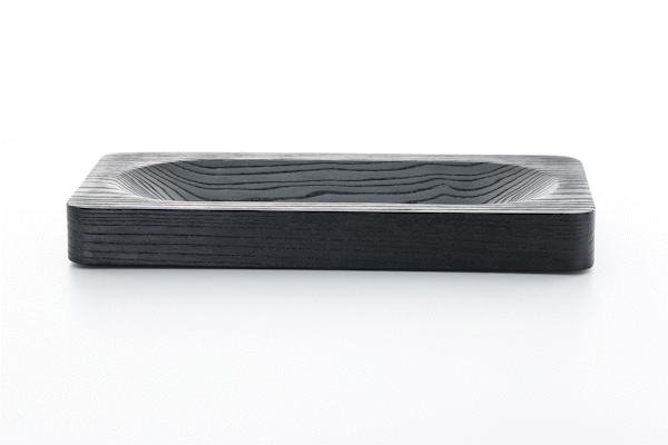 Animated close-up of yakisugi wood finish by Anonymia, studio shot