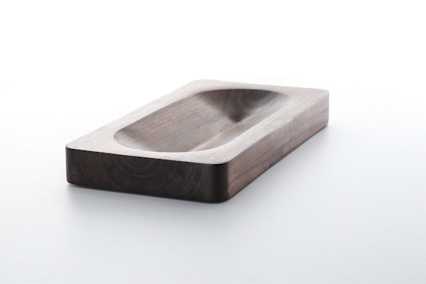 Animated close-up of walnut wood finish by Anonymia, product detail view