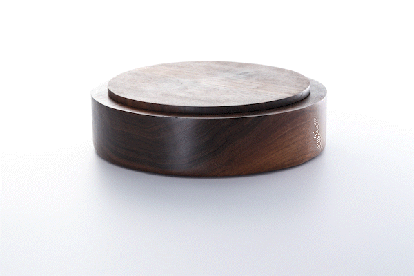 Animated close-up of walnut wood finish by Anonymia, studio shot