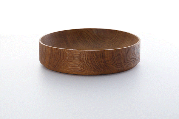 Animated close-up of sandblasted oak wood finish by Anonymia, in natural light