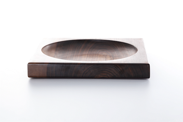 Animated close-up of walnut wood finish by Anonymia, lifestyle detail