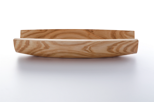 Animated close-up of oiled ash wood finish by Anonymia, studio shot