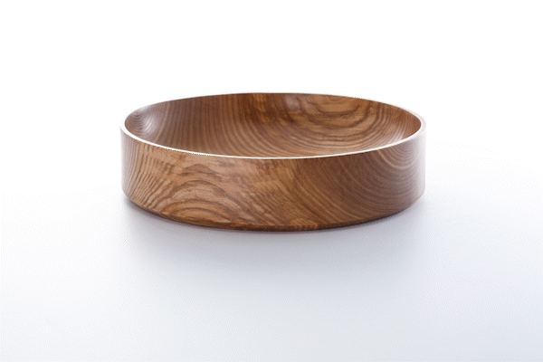 Animated close-up of oiled ash wood finish by Anonymia, lifestyle detail