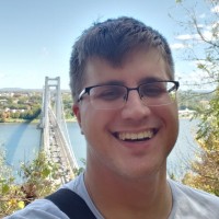 John is a white male smiling in outdoor