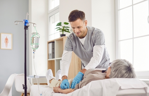 Female doctor talking to patient