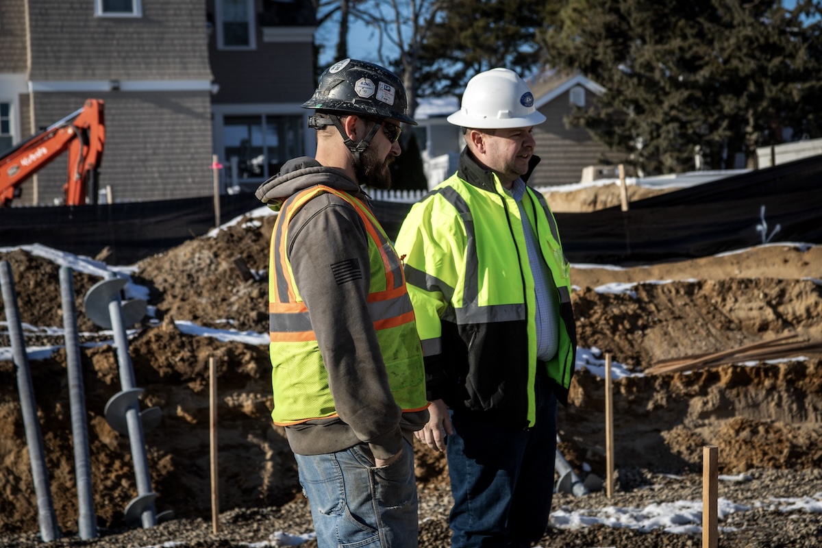 Tim O'Neill, owner of O'Neill Bowes, oversees a heavy operation on a job site in Mashpee MA