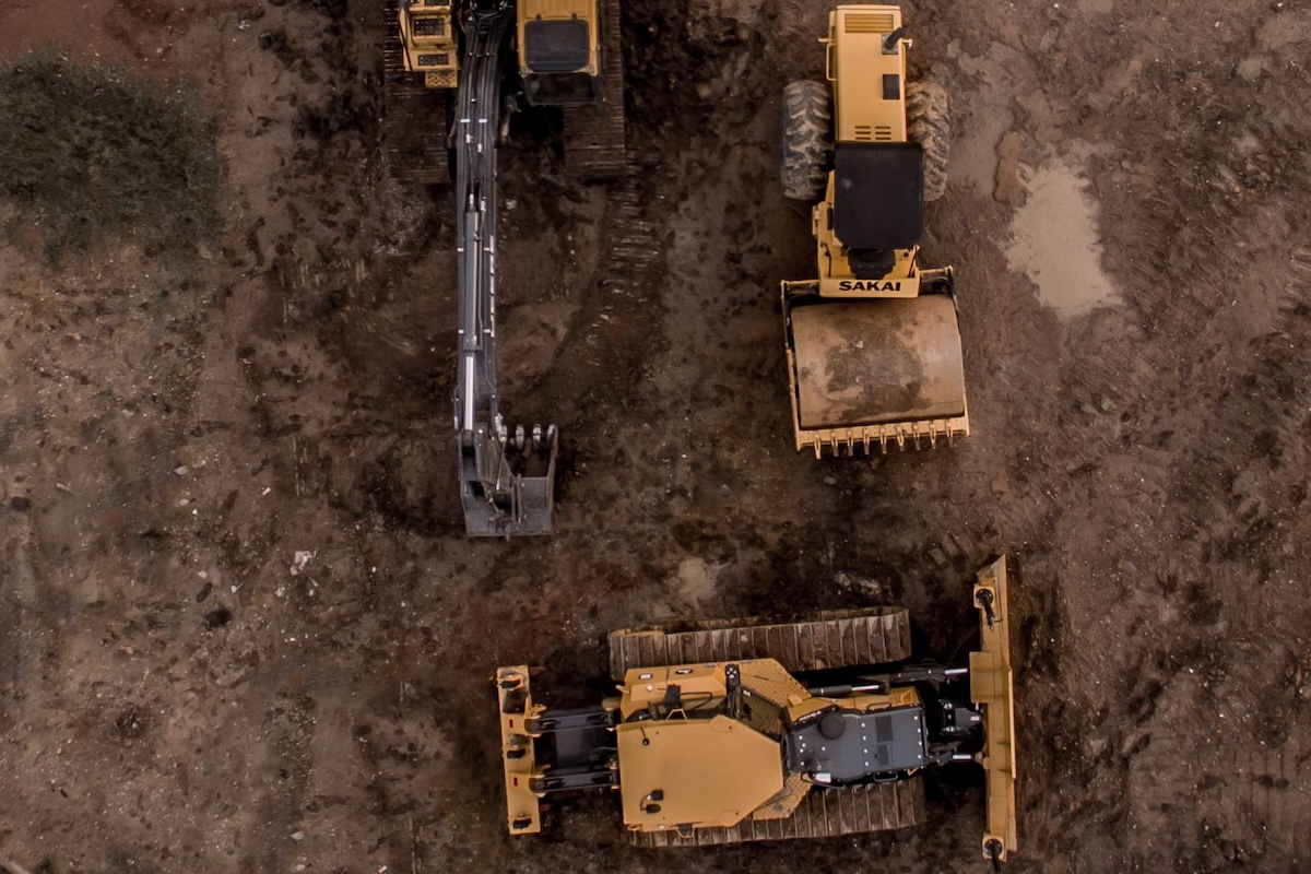 Heavy machinery and trucks on an O'Neill Bowes' building project on Cape Cod
