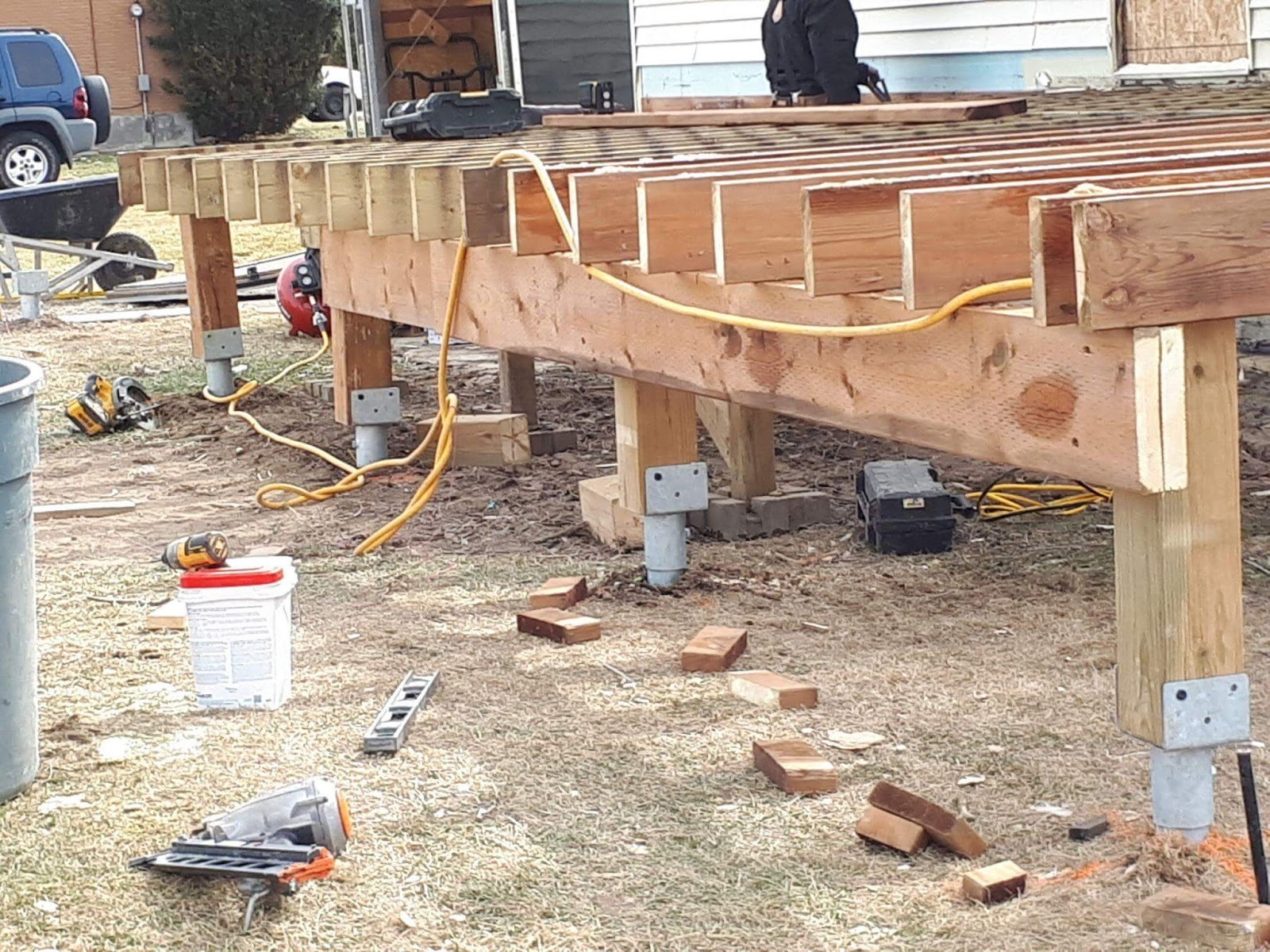 Man constructing wooden framework