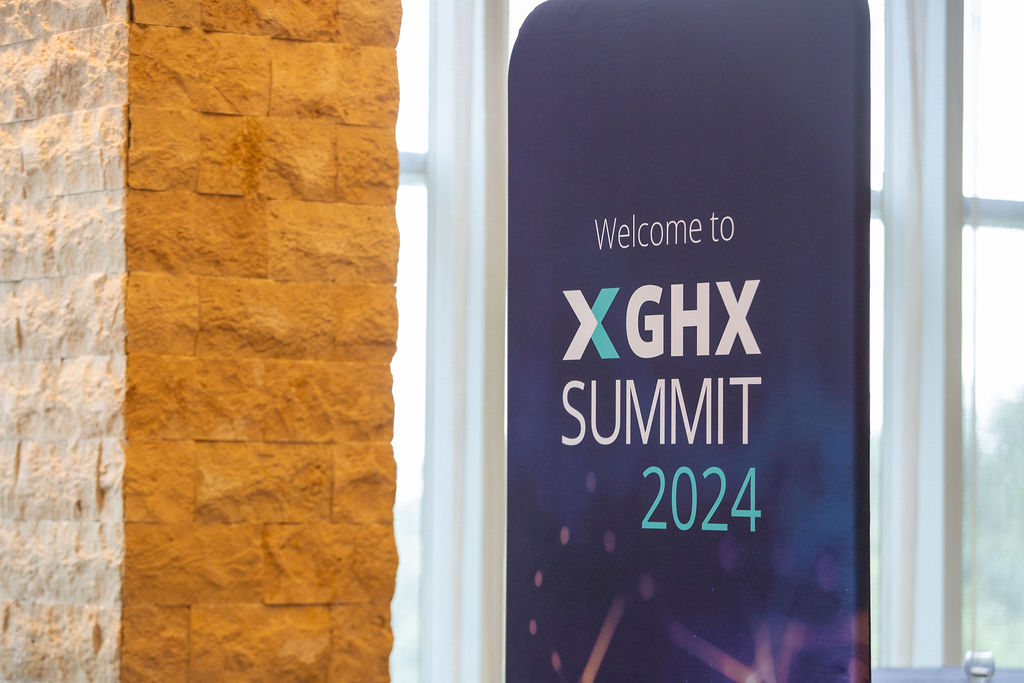 A Welcome to GHX Summit 2024 sign for Chelcy Walczy's testimonial video