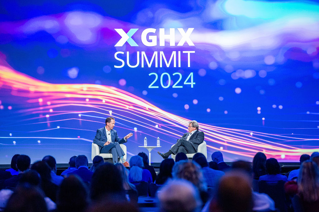 A fireside chat takes place on Imprint's custom stage design at GHX Summit 2024