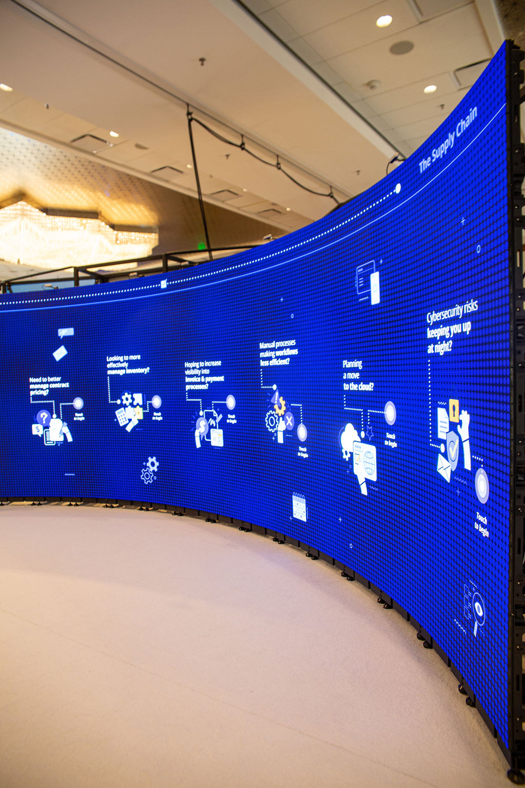 Imprint's curved LED wall displays GHX product data for attendees at the GHX Summit