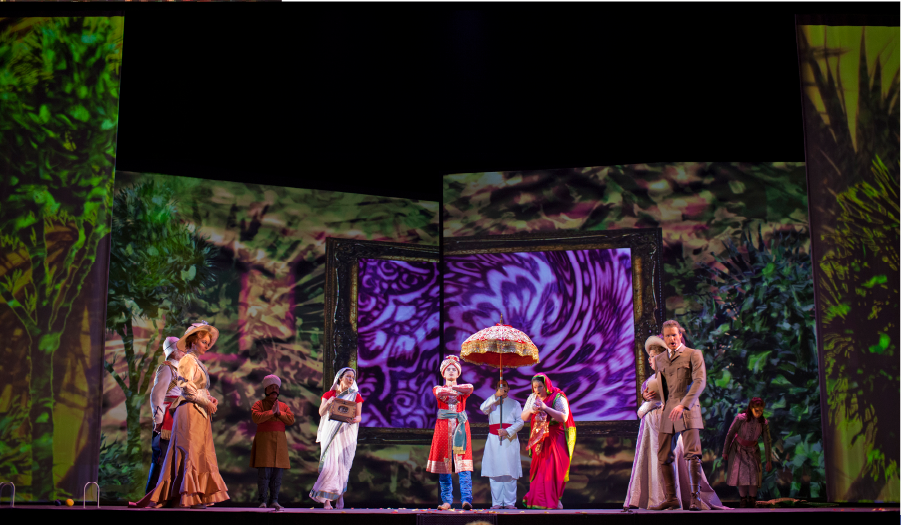Costumed performers appear on Imprint's themed stage set at the Seacret Conference