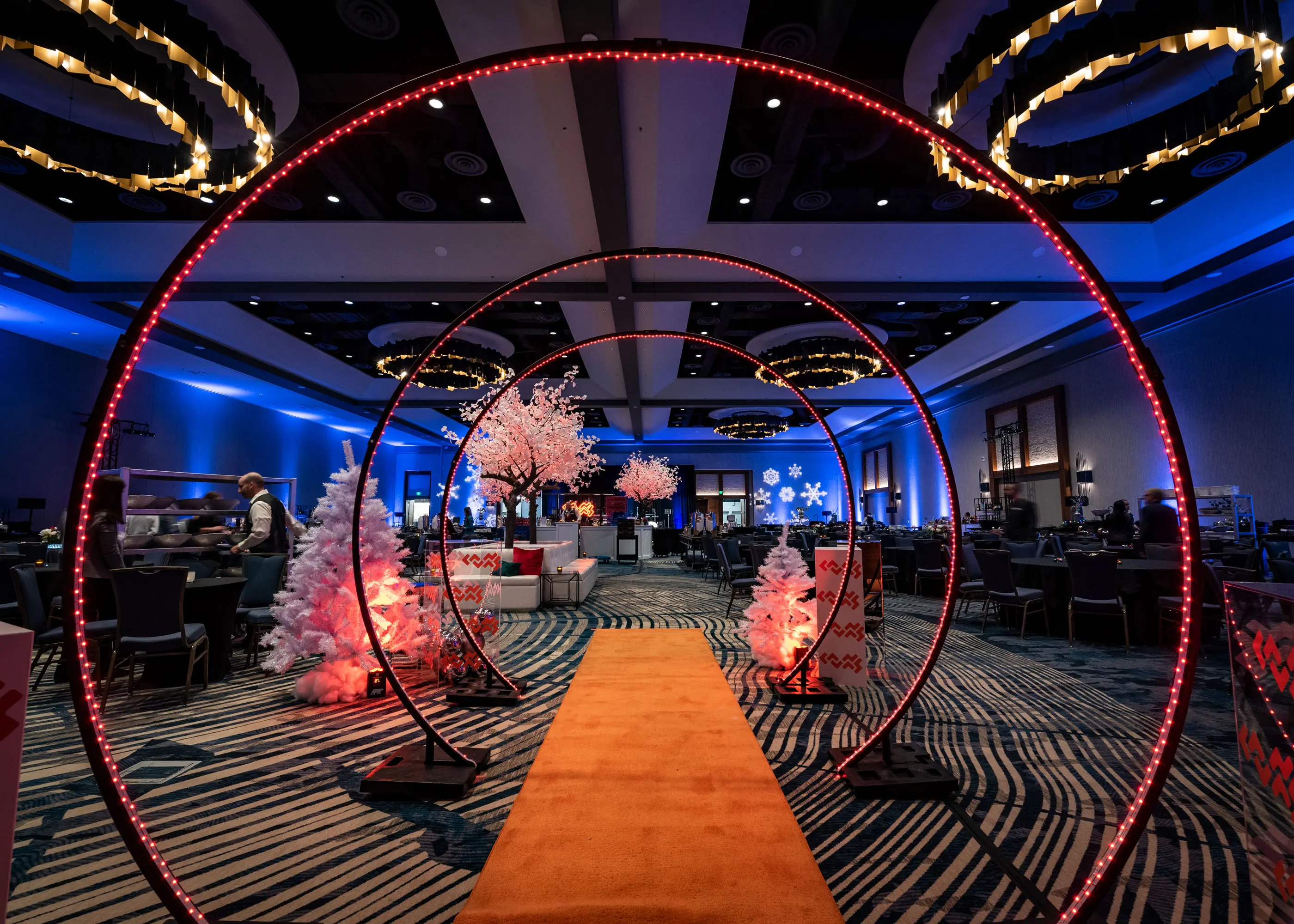 Imprint's illuminated archway design transforms the Canvas Holiday Party into an indoor winter wonderland