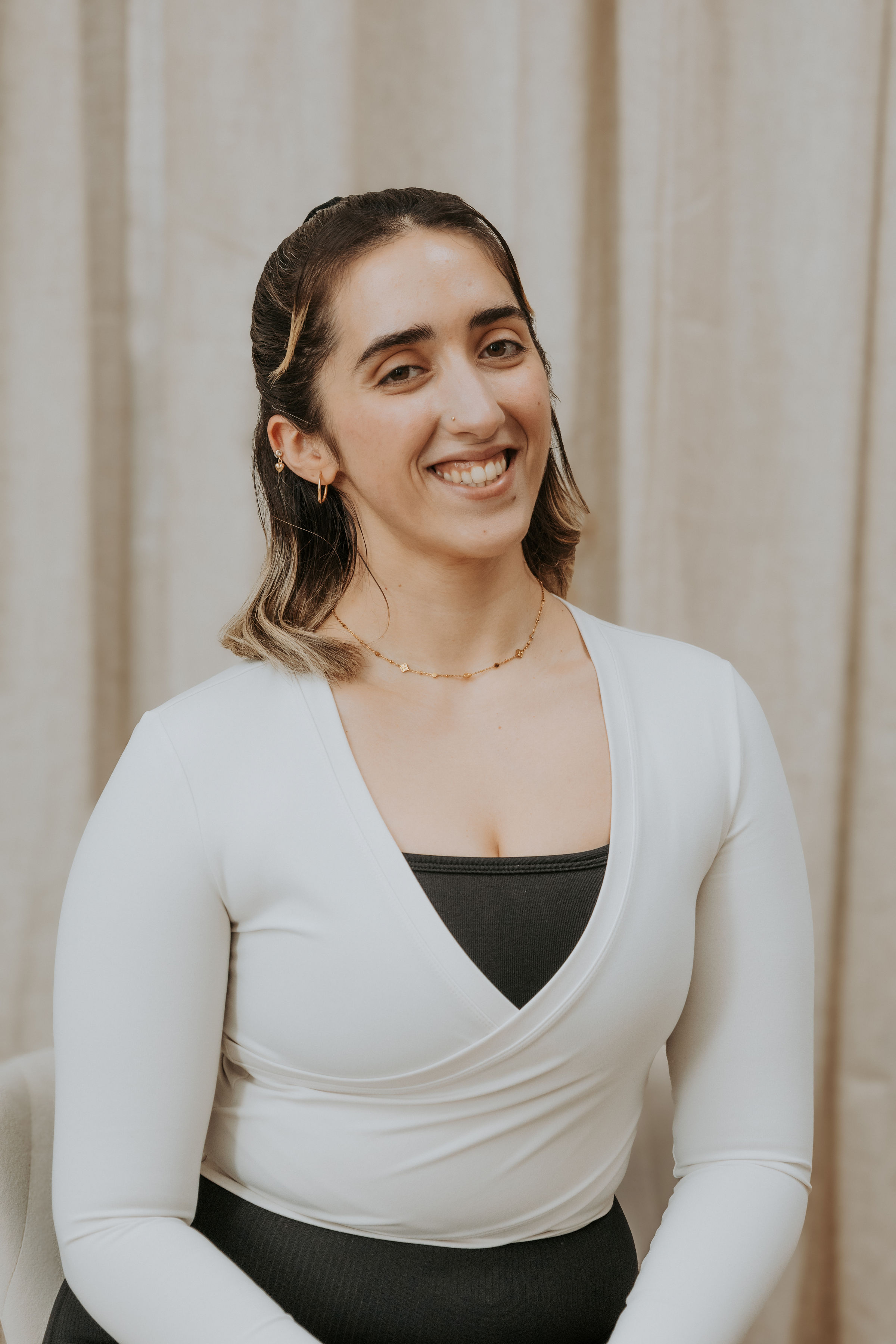 Certified Yoga Therapist Emma Seston practicing Yoga as offered at Embark Physical Therapy & Wellness in Kitchener-Waterloo