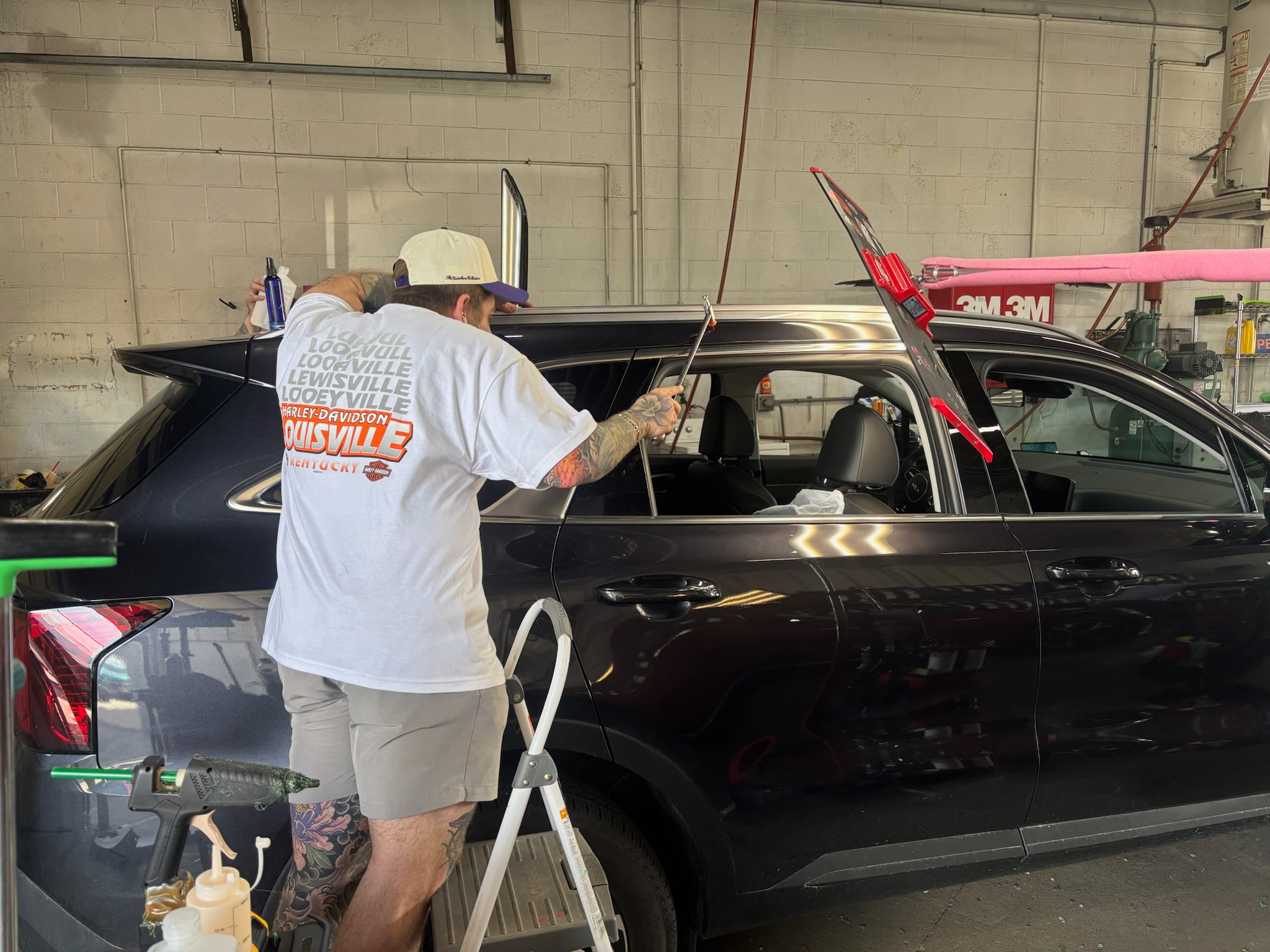 Total Hail Solutions team members in a professional hail repair environment