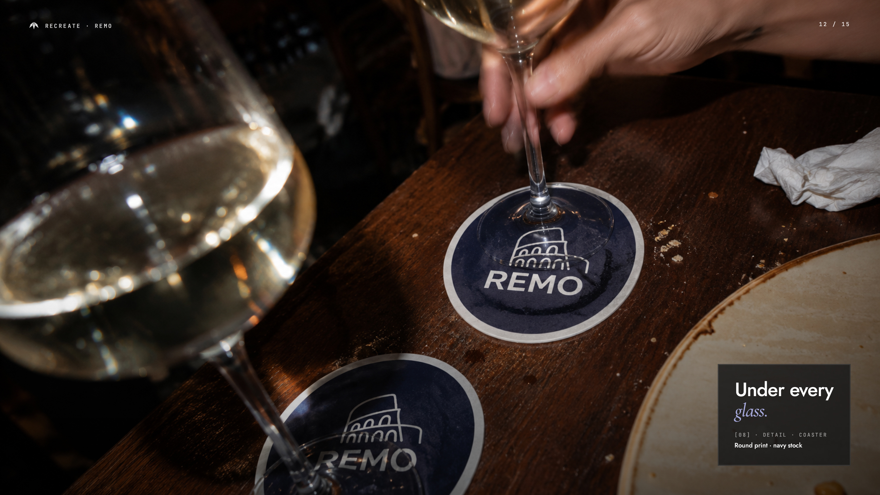 REMO branded coaster photographed during restaurant service