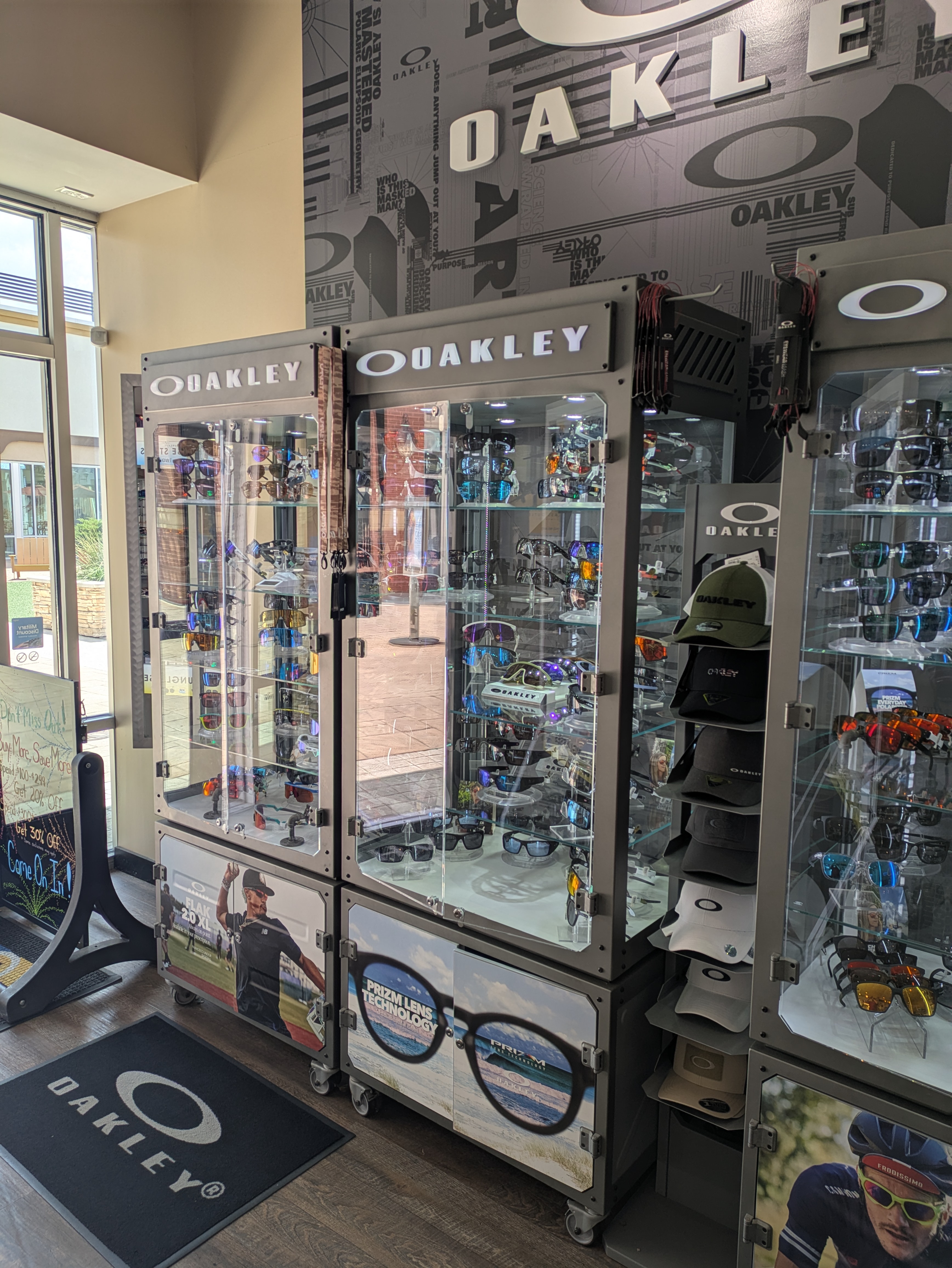Oakley performance sunglasses display in Fort Worth Select Shades Sunglass outlet store