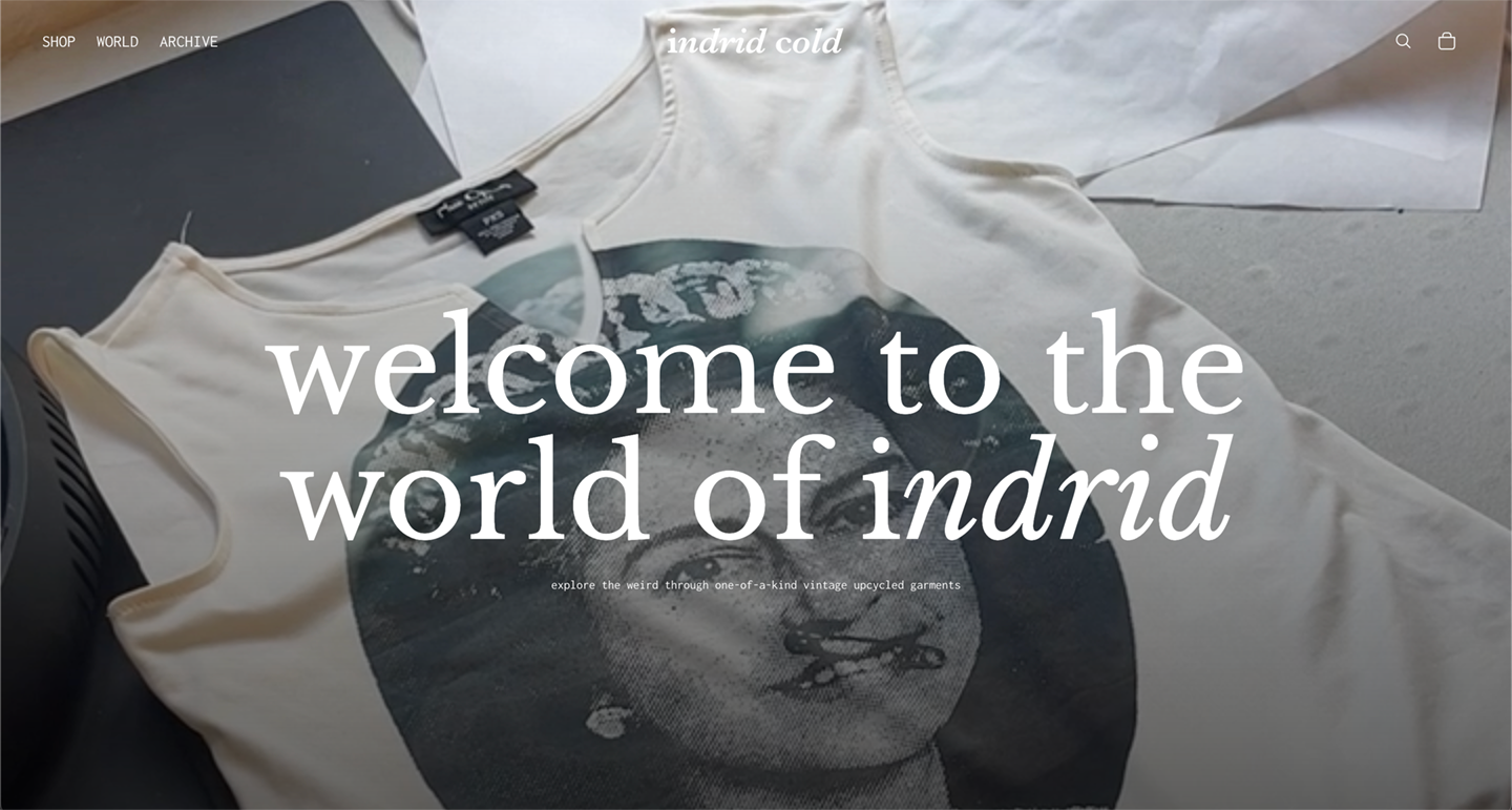 A mobile phone in the back pocket of a woman wearing jeans, with a flower in the pocket with the phone