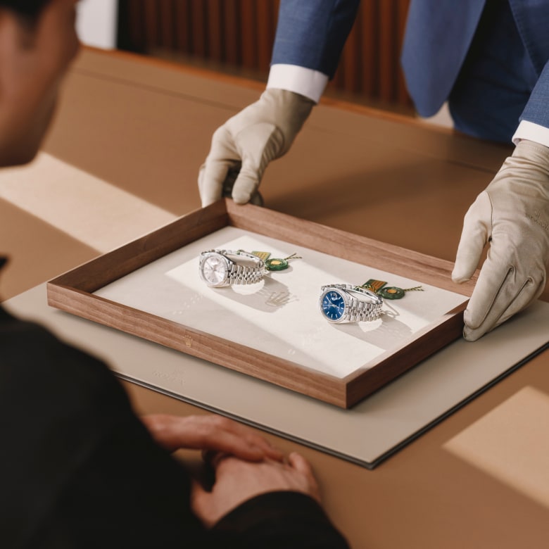 Two Rolex timepieces being presented – link to send a message to Langfords Jewellers