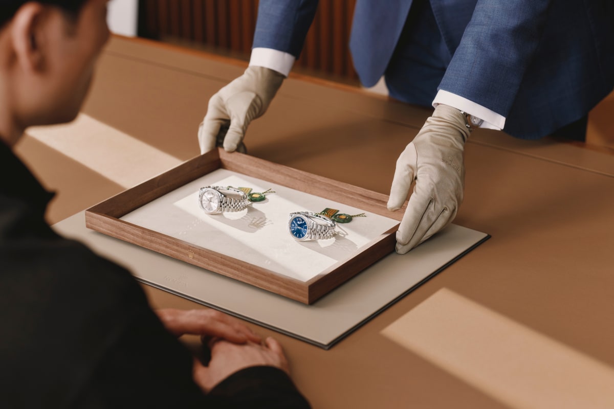 Two Rolex timepieces being presented – link to send a message to Langfords Jewellers