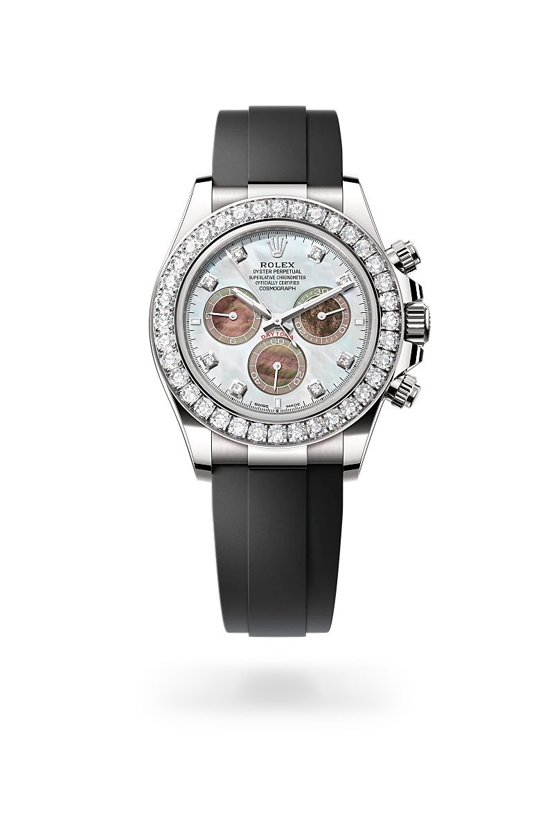 Rolex Cosmograph Daytona in 18 ct white gold with a White and black mother-of-pearl diamond set finish dial, diamond set bezel, and high-performance elastomer bracelet