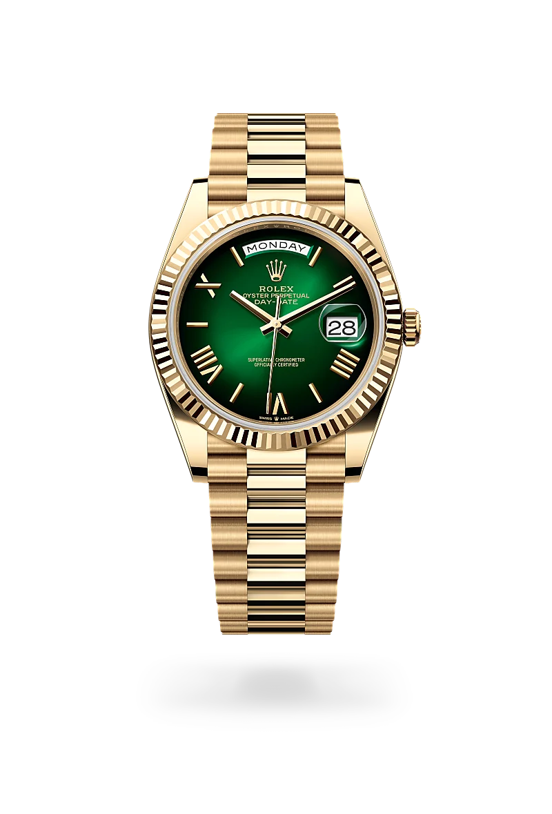 Rolex Day-Date 40 in 18 ct yellow gold with a Green ombr� finish dial, fluted bezel, and 18 ct yellow gold bracelet