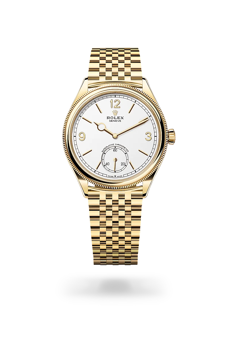 Rolex 1908 in 18 ct yellow gold with a Intense white finish dial, domed and fluted bezel, and 18 ct yellow gold bracelet