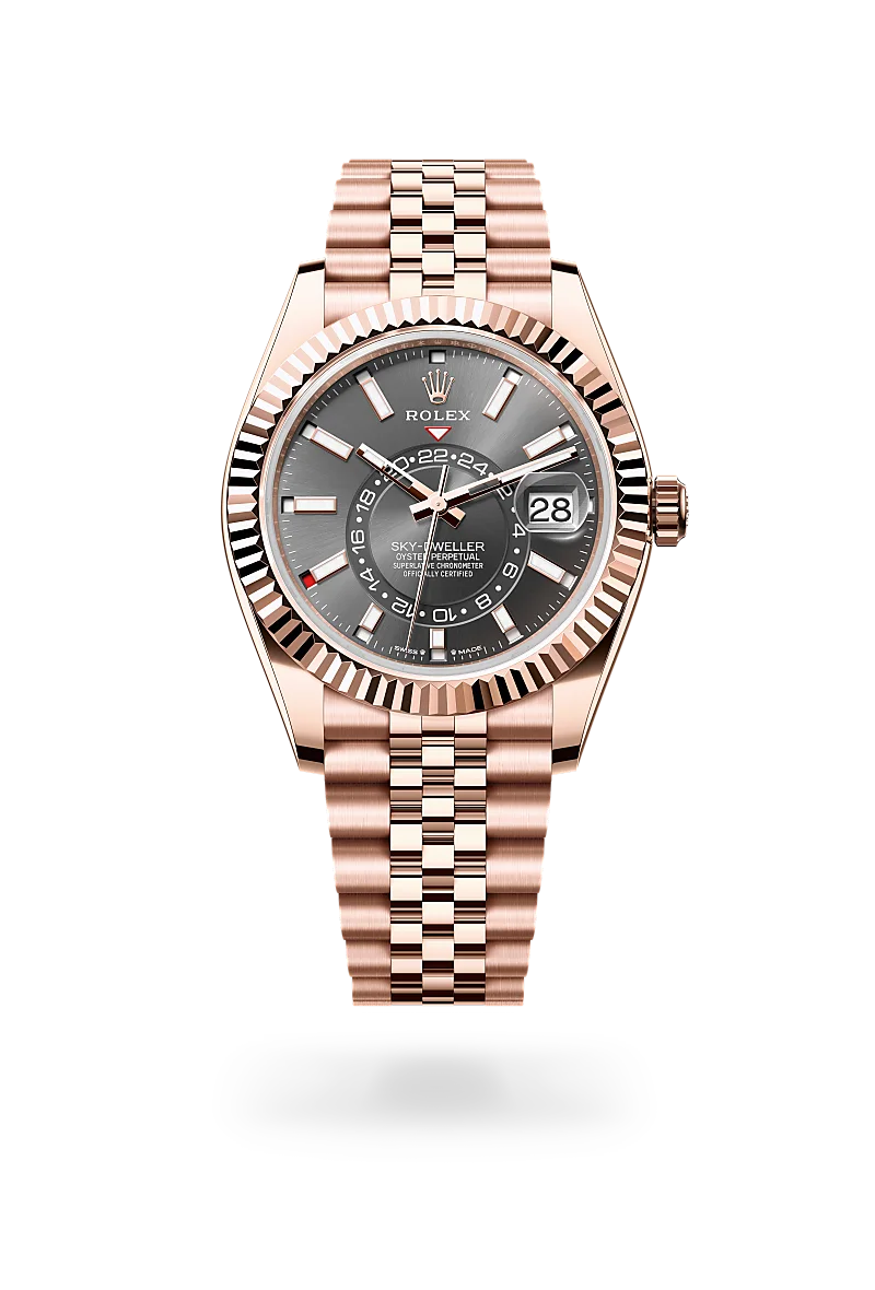 Rolex Sky-Dweller in 18 ct Everose gold with a Slate finish dial, fluted, Rolex Ring Command bezel, and 18 ct Everose gold bracelet