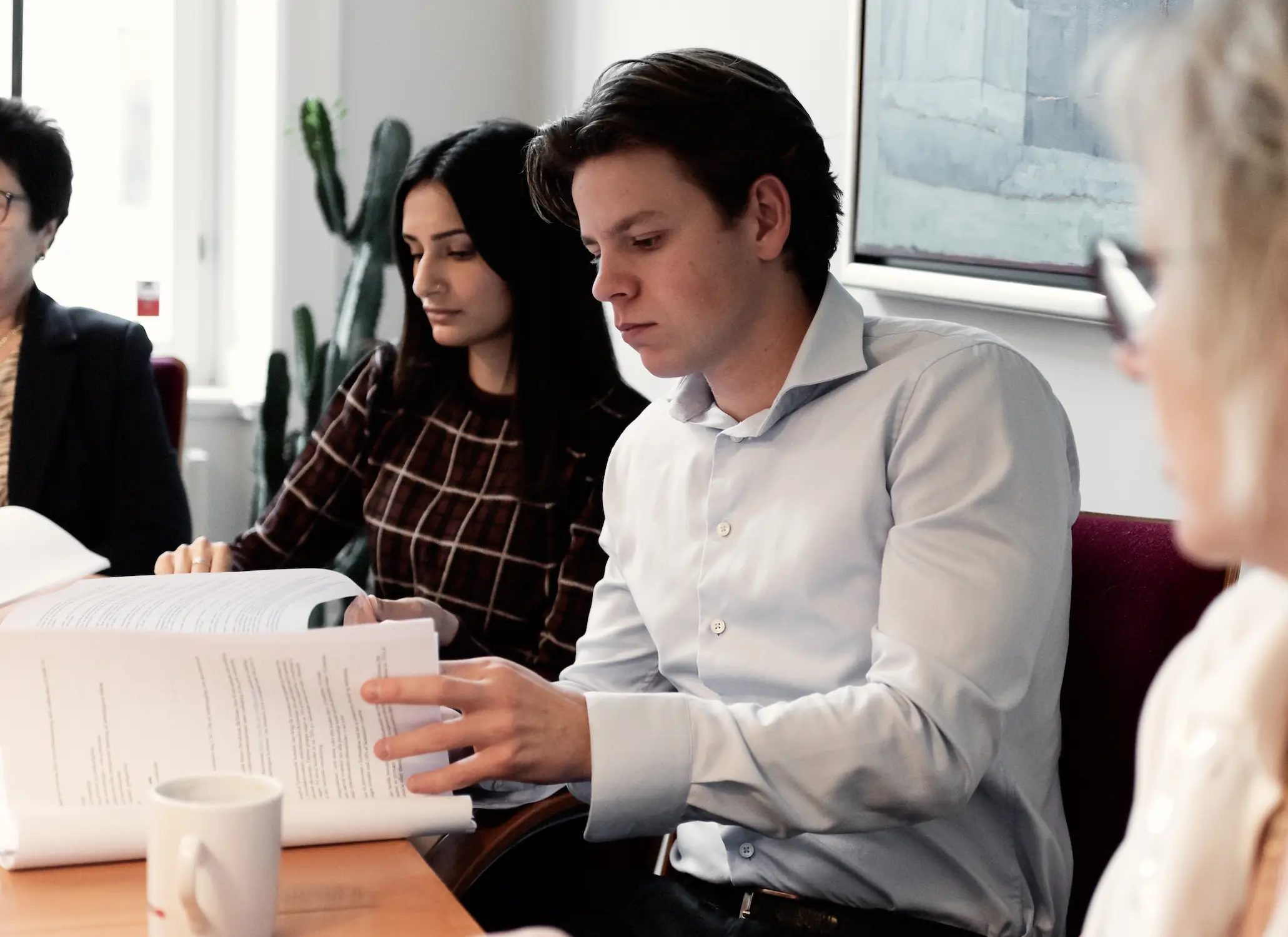 Meeting with a tax adviser – reviewing capital income, interest, gains/losses and deductions.