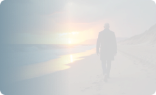 Man walking along the beach, alone