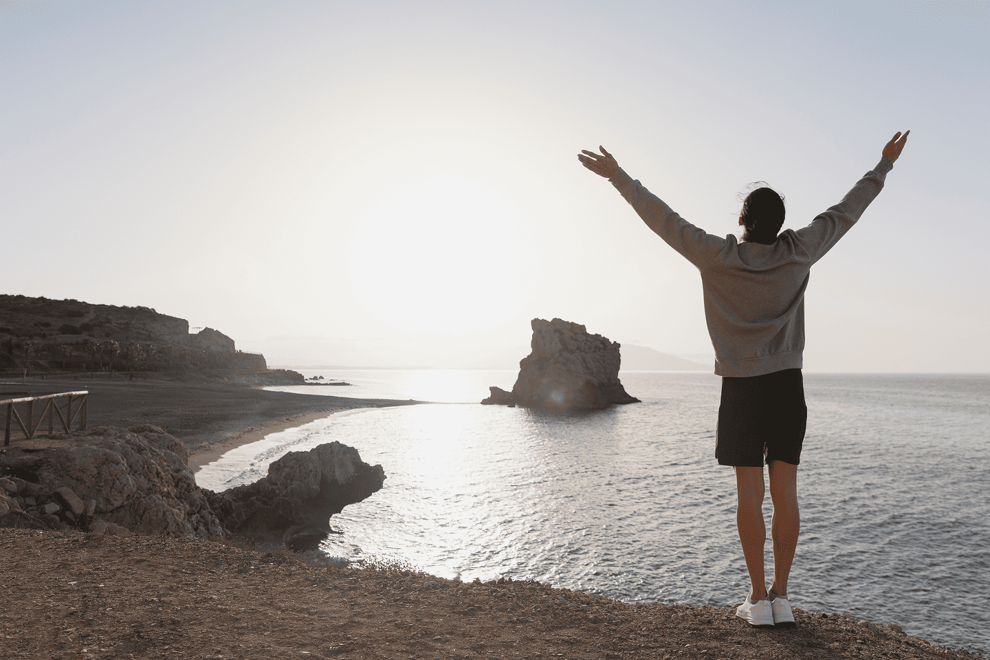 Man on the beach enjoying freedom