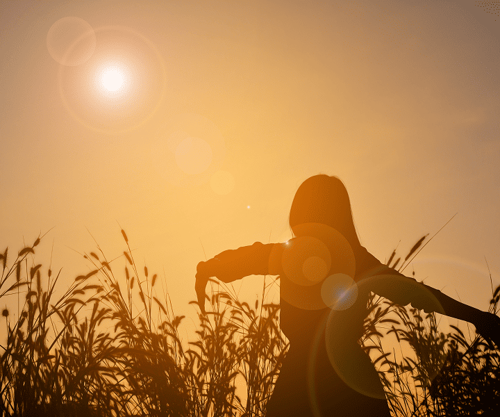 Woman dancing on the sunshine