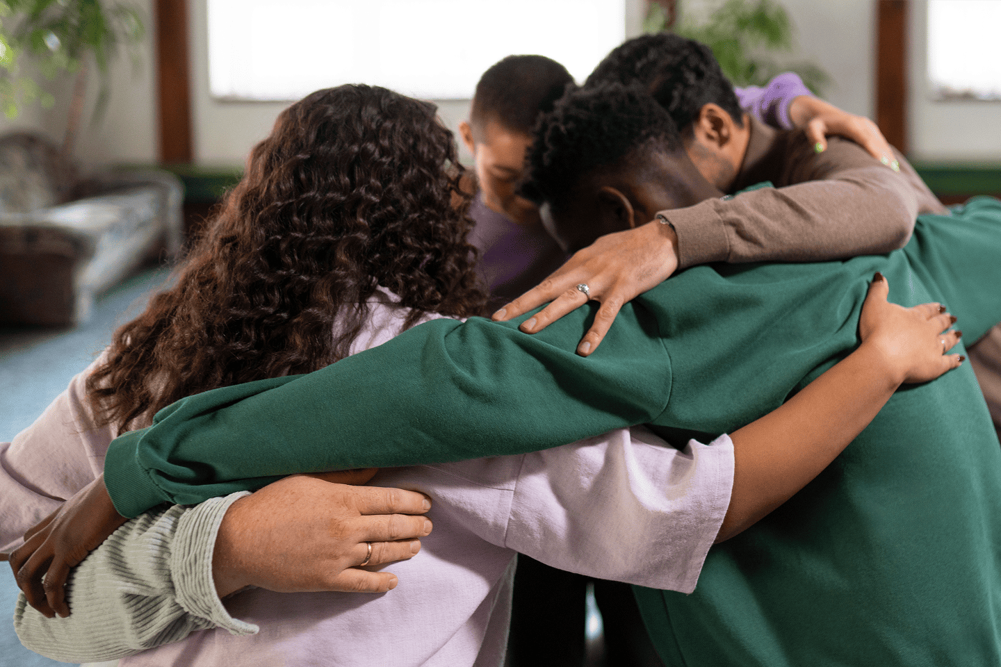 A group of people hugging