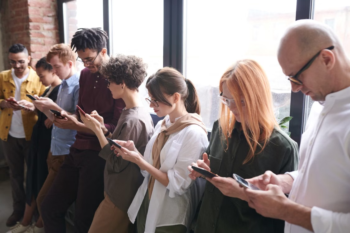 people holding and using their phones
