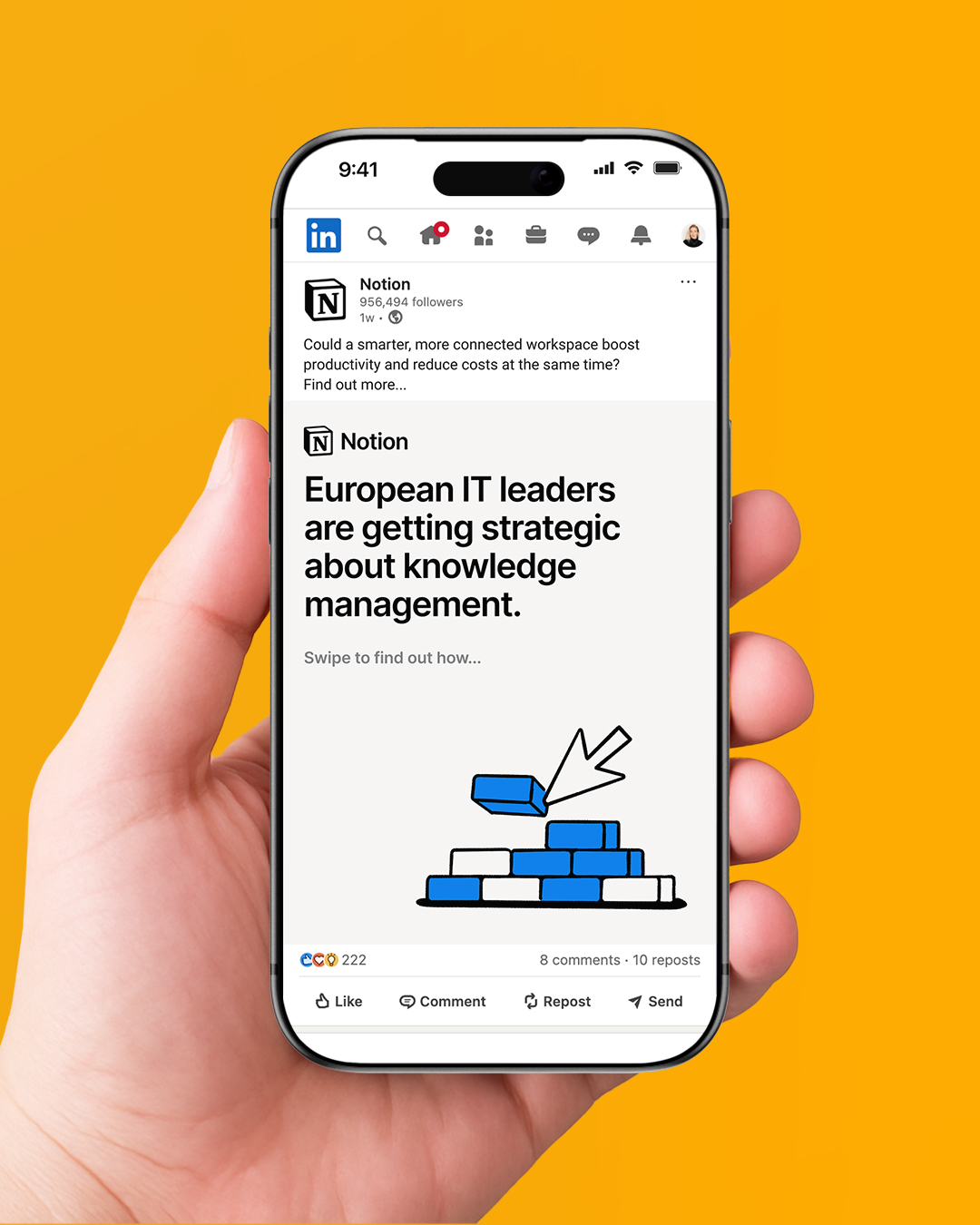 Hand holding a smartphone displaying a LinkedIn post by Notion about European IT leaders becoming strategic in knowledge management, featuring a graphic of blue and white blocks being stacked.