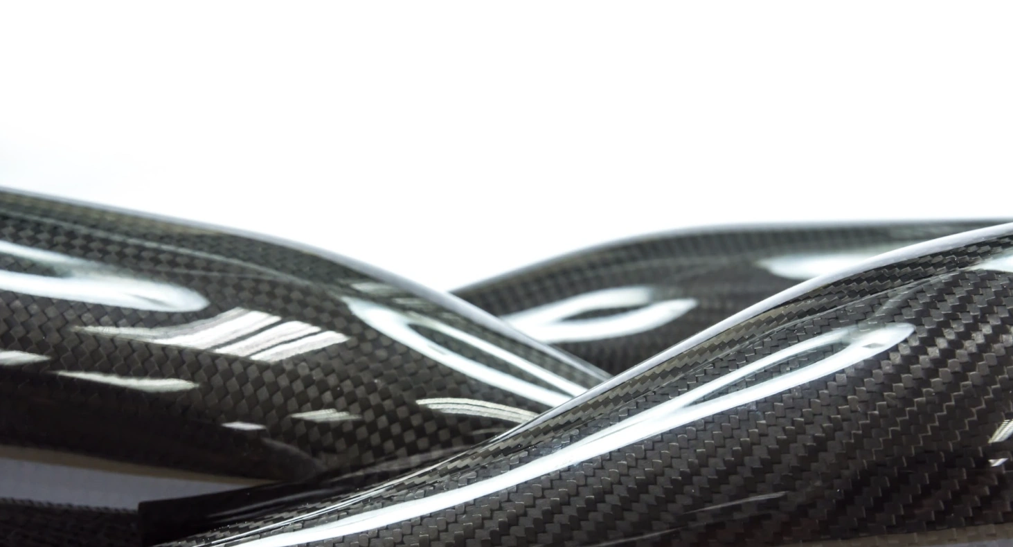 Glossy carbon fiber ducts made with out-of-autoclave prepreg