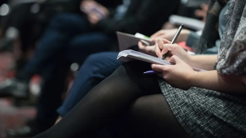 in-person conference