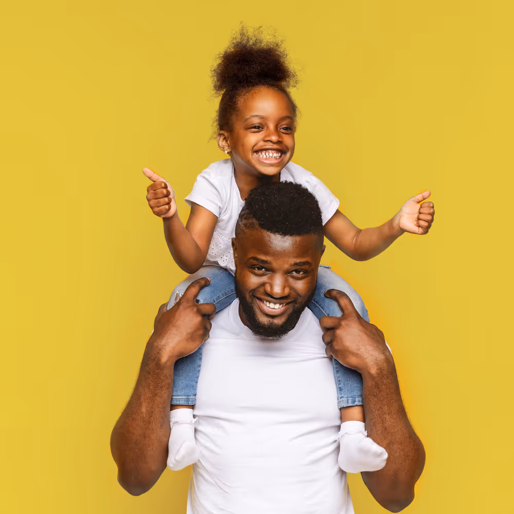 daughter on fathers shoulder