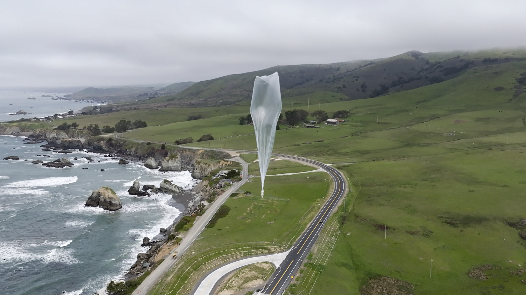 Balloon flying along the coastline