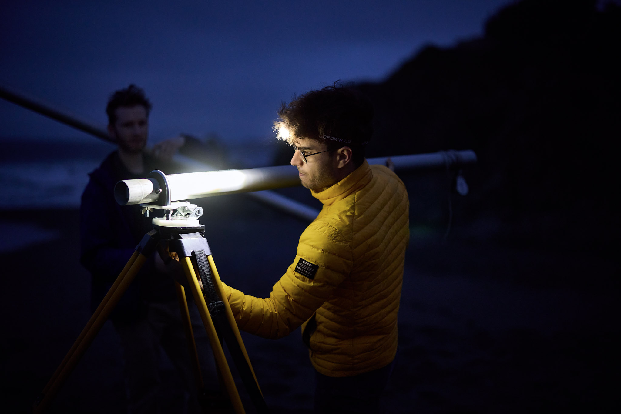 Engineers setting up launch rig at dawn