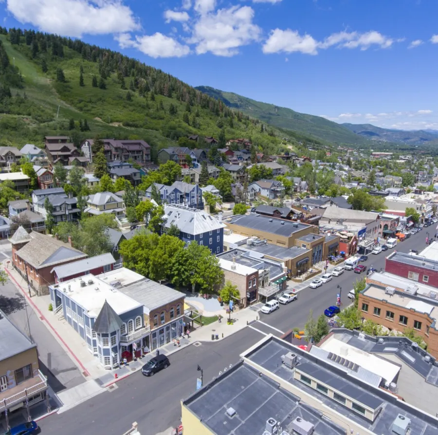 father and child walking on carpet
