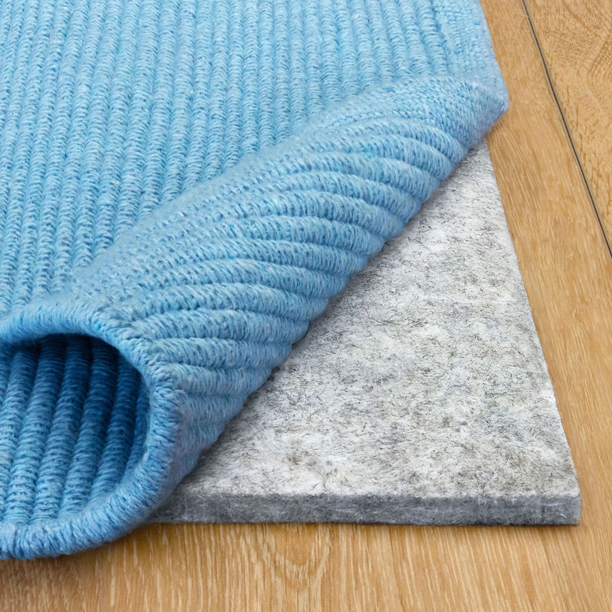 The Hidden Benefits of Professional Rug Padding