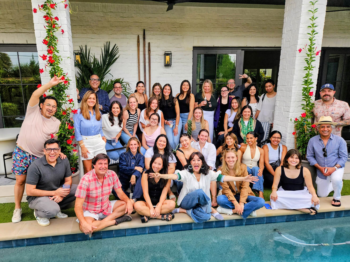 Group photo by the pool.