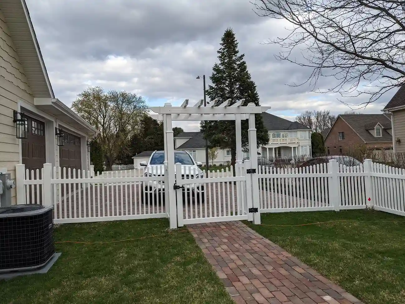 first photo of white beautiful fence